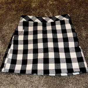 Black and white child’s plad skirt